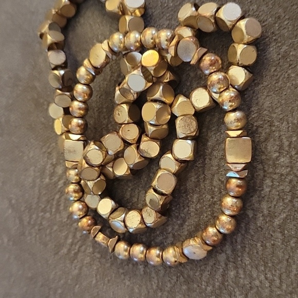 3/$30 Matte Goldtone Metal Stretch Bracelets - Picture 3 of 4